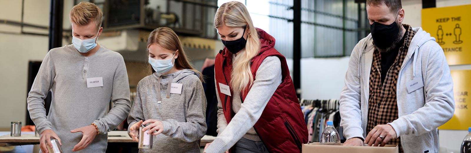 group of people gathering supplies for donation.jpg