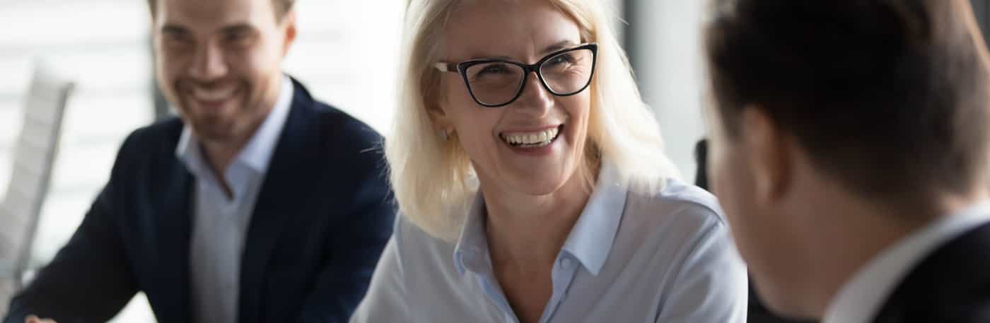 middleaged business woman in meeting.jpg