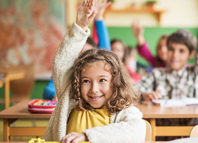 kids in school raising their hands mobile 767x554.jpg