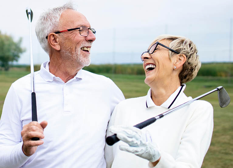 retired couple playing gold mobile.jpg