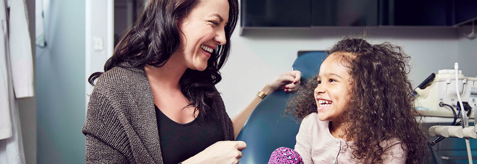 mom and daughter at the dentist desktop 1600x552.jpg