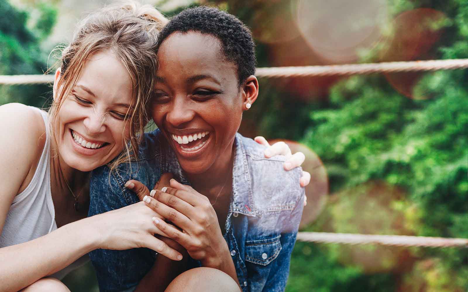 women friends laughing outside in the summer 3.jpg