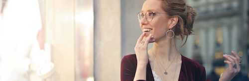 woman wearing glasses smiling-mobile.jpg