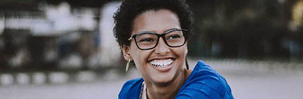 woman with glasses smiling 2.jpg